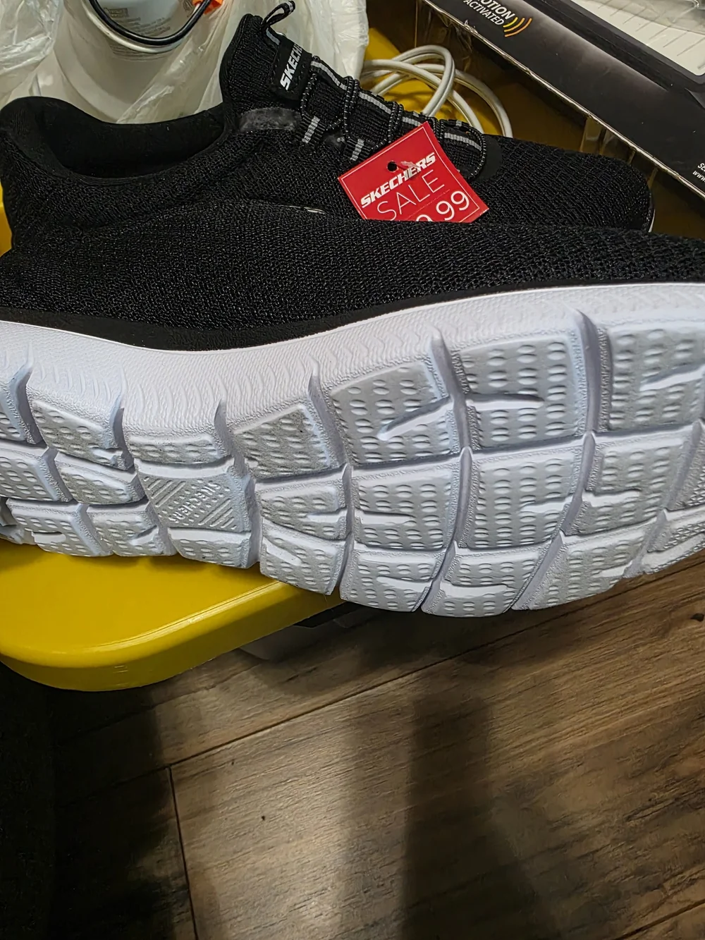 Skechers Black Slip-On Athletic Sneakers with White Soles